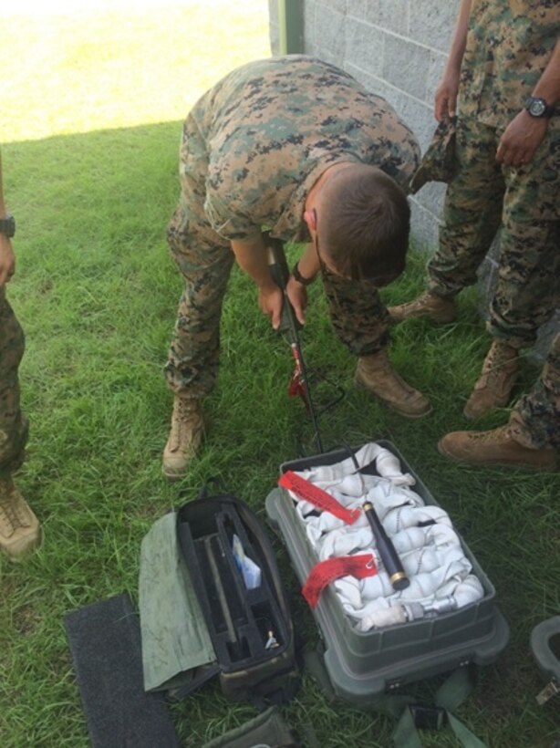 On June 16, 2016 First Lieutenant Jonathan Lanning Keller, a Marine attached to Combat Engineer Officer course 5-16 (CEO 5-16); practices setting up an Anti-Personnel Obstacle Breaching System (APOBS) during practical application training. Combat Engineer Officer students are given exposure to a wide variety of breach assets.
