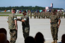 Sgt. Maj. William Oldenburg relinquished the sword of office to Sgt. Maj. Charles Metzger in a relief and appointment ceremony on Marine Corps Air Station New River July 8. Oldenburg retired after 30 years of service during a retirement ceremony after serving the Marines, sailors and civilians of MCAS New River as the senior enlisted advisor since April, 2014.