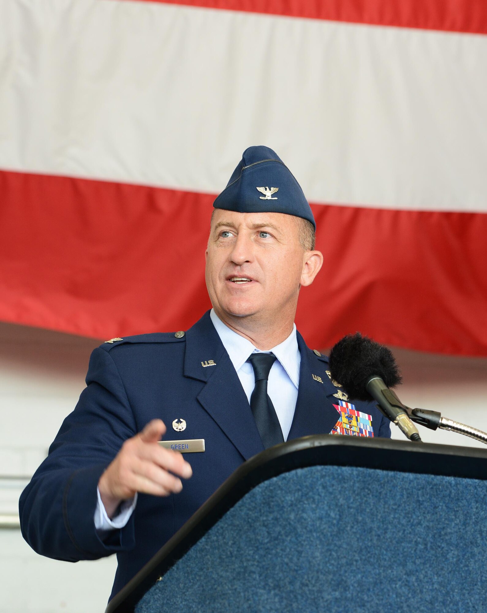 Col. Nathan Green, Air Force Special Operations Air Warfare Center commander, speaks after assuming command of AFSOAWC at Hurlburt Field, Fla., July 11, 2016. Green was previously the commander of the 752nd Special Operations Group at RAF Mildenhall, England. (U.S. Air Force photo/Staff Sgt. Melanie Holochwost)