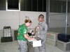 Then-Capt. Kristina McElroy in-processing newly-arrived pets in Vilseck, Germany, in 2006. (Photo Credit: courtesy)