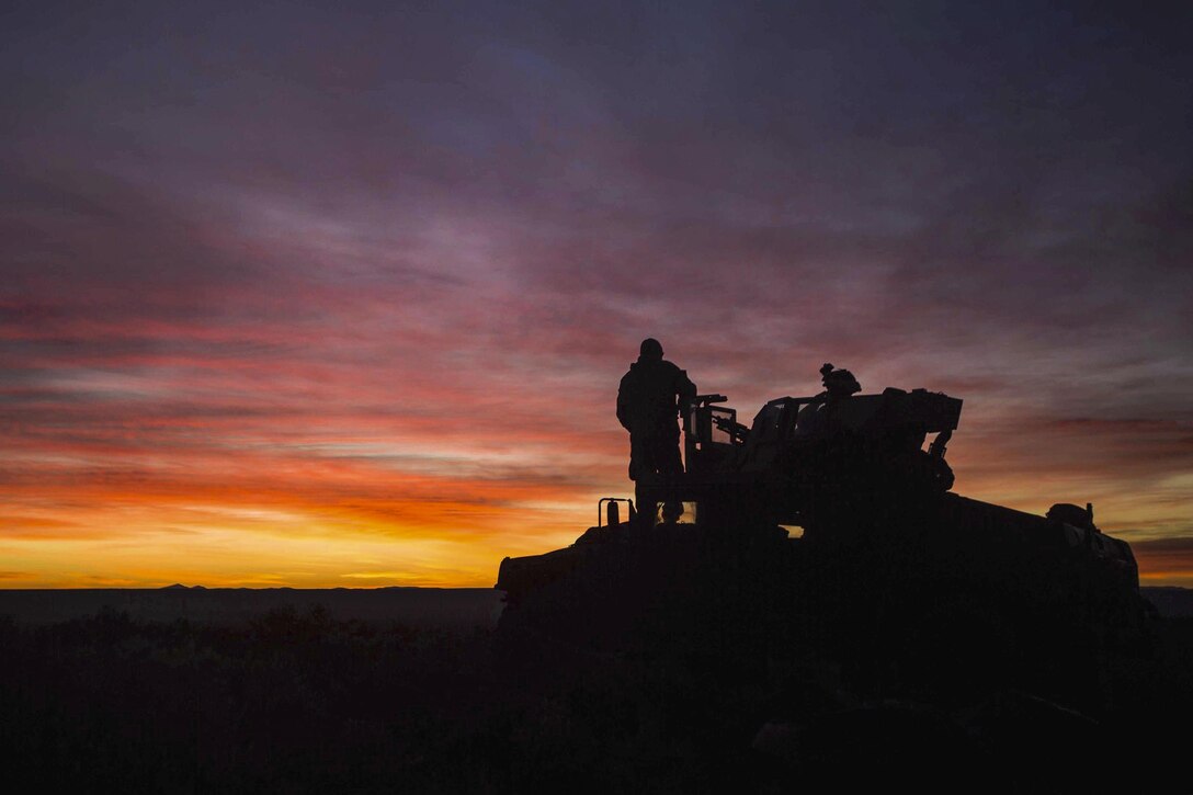 Marines prepare for a possible simulated attack at dawn during Exercise Hamel at the Cultana Training Area in Australia, July 9, 2016. Marine Corps photo by Lance Cpl. Osvaldo L. Ortega III