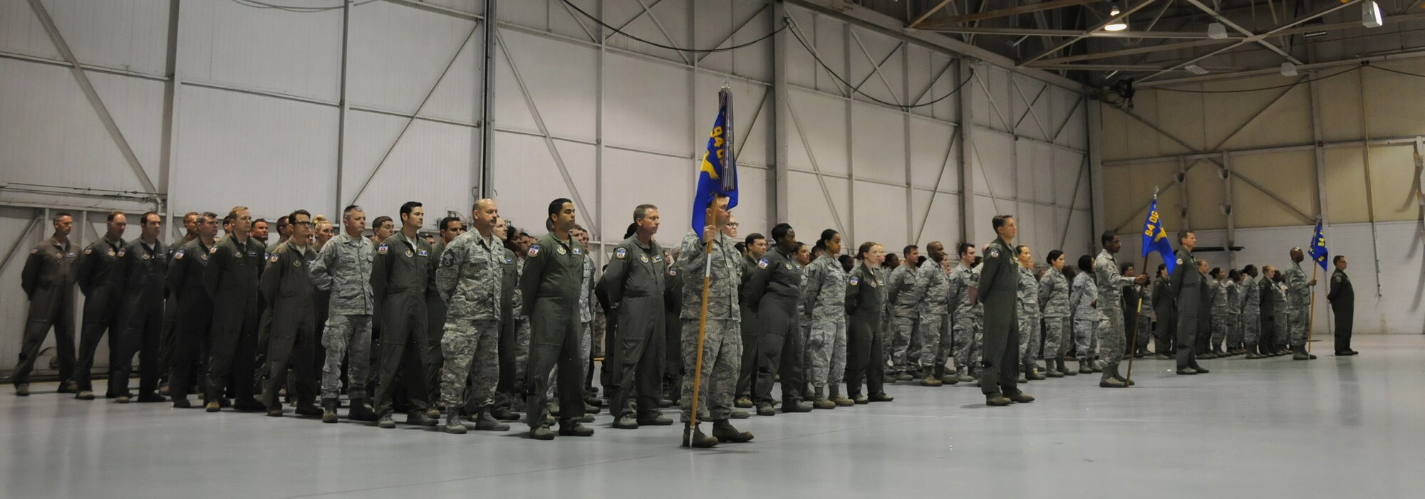 Airmen of the 94th Airlift Wing stand in formation before a change of command ceremony at Dobbins Air Reserve Base, Georgia, on July 10, 2016. Col. Patrick Campbell formally assumed command of the 94th Operations Group of the group during the event. (U.S. Air Force photo by Staff Sgt. Alan Abernethy)