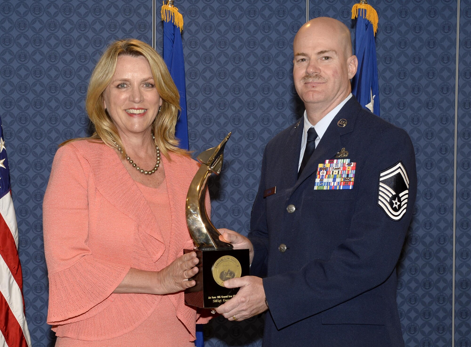Retired Senior Master Sgt. Eugene Cave Jr. served as the maintenance superintendent for the 8th Expeditionary Air Mobility Squadron at Al Udeid Air Base, Qatar. He executed a no-notice aircraft generation, transporting 69 personnel and 47,000 pounds of equipment, directly supporting the Nepal earthquake relief mission. Cave also planned and deployed 11 maintenance recovery teams, safely recovering $890 million in aircraft assets. (U.S. Air Force photo/Andy Morataya)