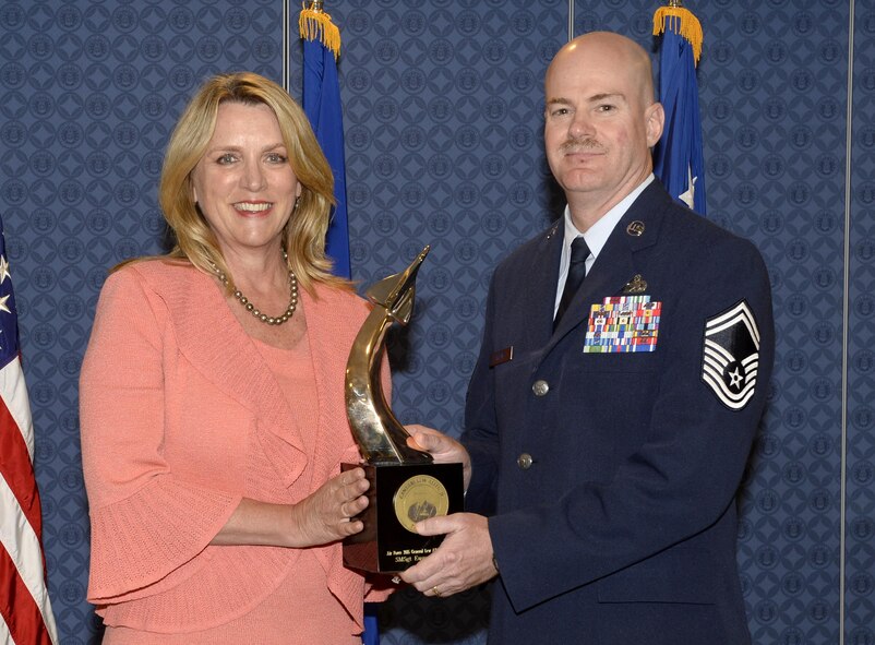 Retired Senior Master Sgt. Eugene Cave Jr. served as the maintenance superintendent for the 8th Expeditionary Air Mobility Squadron at Al Udeid Air Base, Qatar. He executed a no-notice aircraft generation, transporting 69 personnel and 47,000 pounds of equipment, directly supporting the Nepal earthquake relief mission. Cave also planned and deployed 11 maintenance recovery teams, safely recovering $890 million in aircraft assets. (U.S. Air Force photo/Andy Morataya)