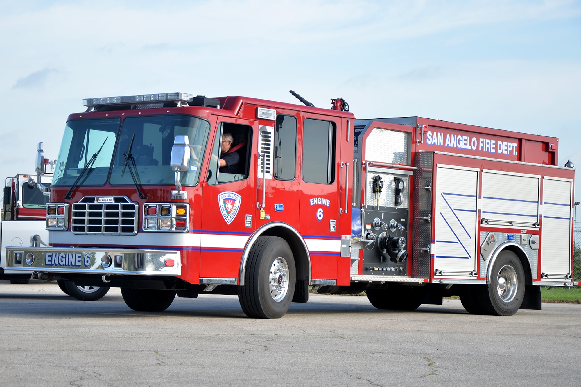 A San Angelo firefighter drives a City of San Angelo fire truck on Goodfellow Air Force Base, Texas, July 8, 2016. The San Angelo Fire Department brought one of its fire trucks onto Goodfellow for maintenance as part of an agreement between Goodfellow and the City of San Angelo. (U.S. Air Force photo by Airman 1st Class Randall Moose/Released)