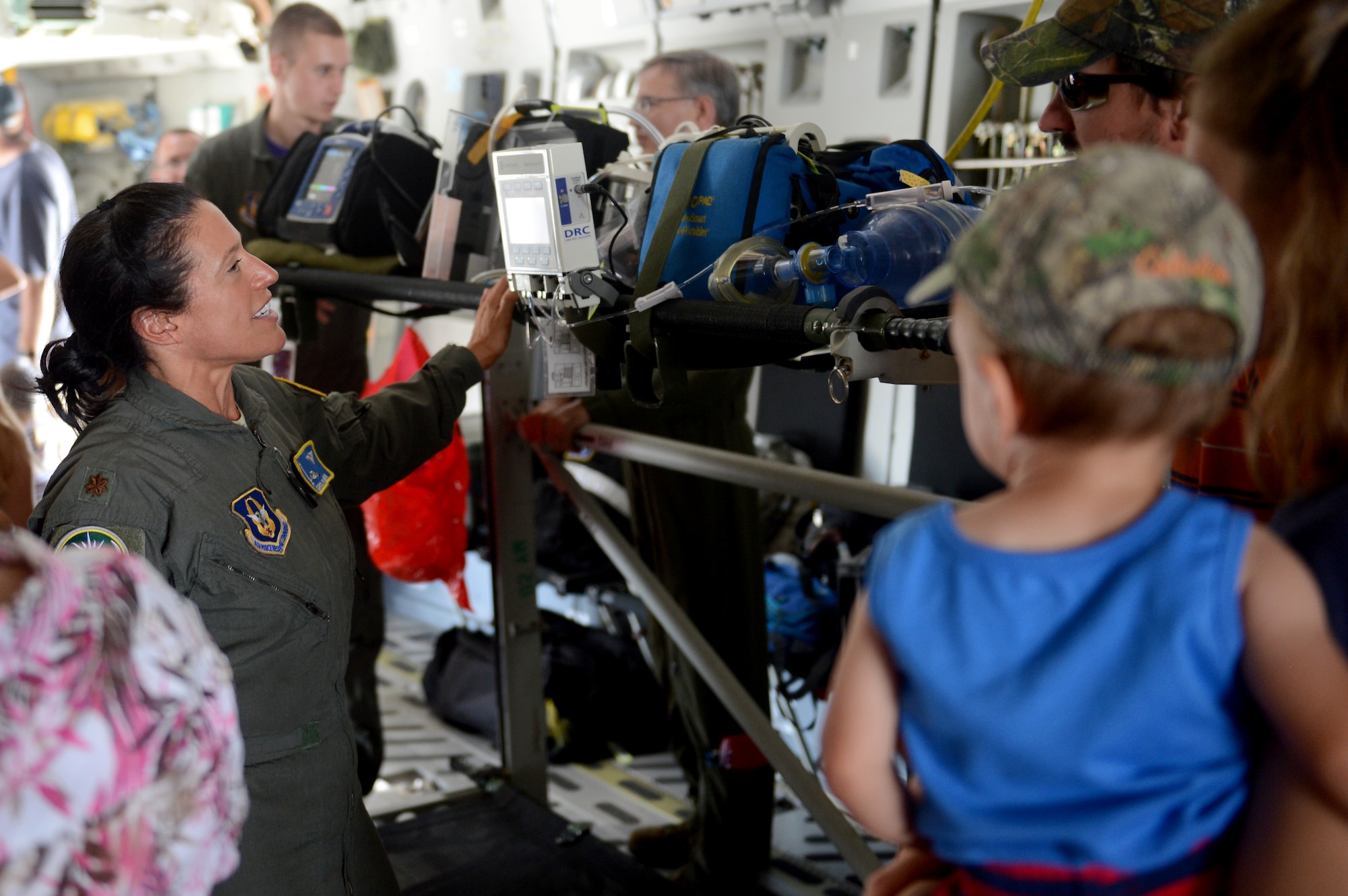 Maj. Carolyn Concia, a flight nurse with the 446th Aeromedical Evacuation Squadron, demonstrates medical equipment during the during the 50th Anniversary of the Port of Moses Lake July 1, 2016 at Grant County International Airport, Wash. (U.S. Air Force photo/Senior Airman Divine Cox)
