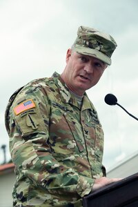 U.S. Army Col. Brian Hughes, Joint Task Force-Bravo commander, speaks during the JTF-Bravo change of command ceremony at Soto Cano Air Base, Honduras, July 7, 2016. Hughes served as the Army Special Operations Aviation Command operations officer and interim chief of staff at Fort Bragg, N.C., followed by a National Security Fellowship at the University of North Carolina, prior to assuming command of JTF-Bravo. (U.S. Army photo by Martin Chahin)