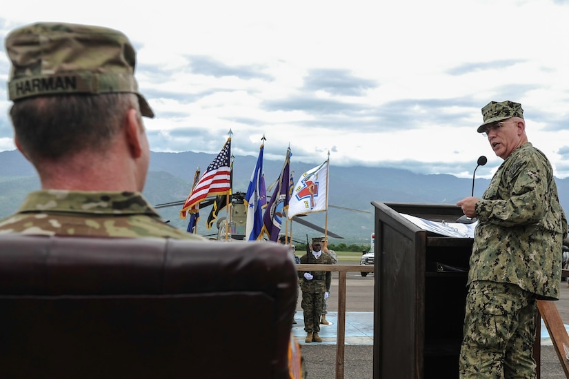 U.S. Navy Adm. Kurt Tidd, commander of U.S. Southern Command, speaks to the outgoing Joint Task Force-Bravo commander, U.S. Army Col. Robert Harman, during the JTF-Bravo change of command ceremony at Soto Cano Air Base, Honduras, July 7, 2016. Under Harman's leadership, JTF-Bravo participated in numerous multinational engagements that promoted mutual trust and effective communication, and enabled interoperability with partner nations. (U.S. Air Force photo by Staff Sgt. Siuta B. Ika)