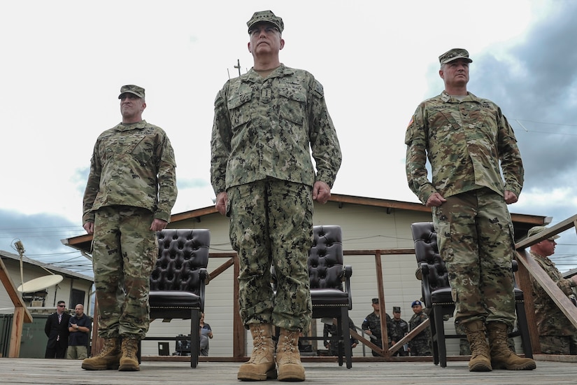 U.S. Navy Adm. Kurt Tidd (center), commander of U.S. Southern Command, stands in front of the outgoing and incoming Joint Task Force-Bravo commanders, U.S. Army Cols. Robert Harman and Brian Hughes, during the JTF-Bravo change of command ceremony at Soto Cano Air Base, Honduras, July 7, 2016. Tidd was the presiding officer of the ceremony, during which command of JTF-Bravo was passed from Harman to Hughes. (U.S. Air Force photo by Staff Sgt. Siuta B. Ika)