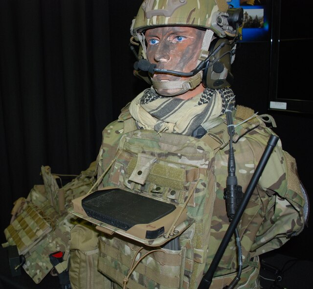 The display shows how the Bat Rack has been integrated into the gear so that the operator can easily access the tablet for needed information in the field. This mounting device was designed by the 711th Human Performance Wing's Battlefield Air Targeting Man-Aided k(N)owledge team--also known as the BATMAN team. (U.S. Air Force photo by Gina Marie Giardina)
