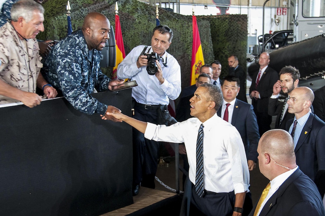 President Barack Obama shakes hands with a sailor after speaking to U.S. and Spanish service members and their families during his visit to Naval Station Rota, Spain, July 10, 2016. Navy photo by Petty Officer 1st Class Brian Dietrick