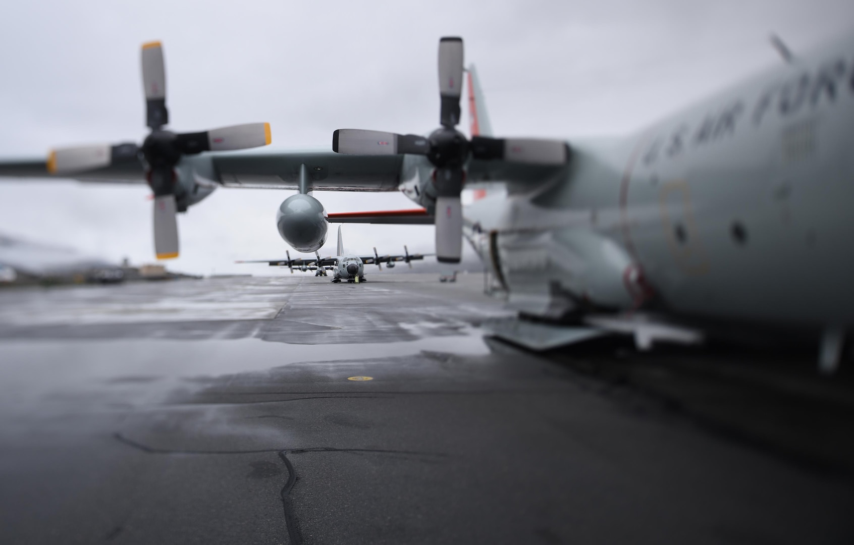 LC-130 "Skibirds" from the New York Air National Guard's 109th Airlift Wing in Scoita, New York, sit on the runway at Kangerlussuaq, Greenland, on June 27, 2016. Four LC-130s and 80 Airmen from the Wing recently completed the third rotation of the 2016 Greenland season. Airmen and aircraft for the 109th Airlift Wing stage out of Kangerlussuaq, Greenland, during the summer months, supplying fuel and supplies and transporting passengers in and out of various National Science Foundation camps throughout the entire season and also train for the Operation Deep Freeze mission in Antarctica. The unique capabilities of the ski-equipped LC-130 aircraft make it the only one of its kind in the U.S. military, able to land on snow and ice.