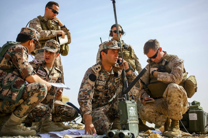 Members of the Jordanian Armed Forces work alongside U.S. Marines with 3rd Air Naval Gunfire Liaison Company, Special Purpose Marine Air Ground Task Force 16.2, to direct air support during Exercise Eager Lion 16 at Armor Range, Quick Reaction Force, Kingdom of Jordan on May 16, 2016. Eager Lion 16 is a US military bi-lateral exercise with the Hashemite Kingdom of Jordan designed to strengthen relationships and interoperability between partner nations while conducting contingency operations. (U.S. Marine Corps photo by Cpl. Lauren Falk 5th MEB COMCAM/Released)