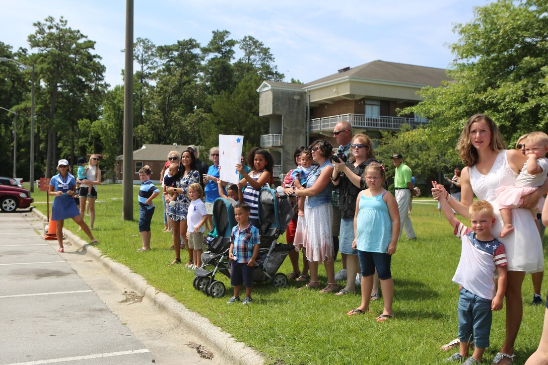 The families of the Marines with the Black Sea Rotational Force wait eagerly to greet their loved ones during a homecoming ceremony on Camp Lejeune, N.C., July 10, 2016. The Marines were greeted by family and friends after returning from a six-month  deployment primarily based in Eastern Europe. (U.S. Marine Corps Photo by Cpl. Shannon Kroening/Released)