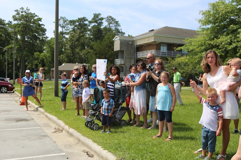 The families of the Marines with the Black Sea Rotational Force wait eagerly to greet their loved ones during a homecoming ceremony on Camp Lejeune, N.C., July 10, 2016. The Marines were greeted by family and friends after returning from a six-month  deployment primarily based in Eastern Europe. (U.S. Marine Corps Photo by Cpl. Shannon Kroening/Released)