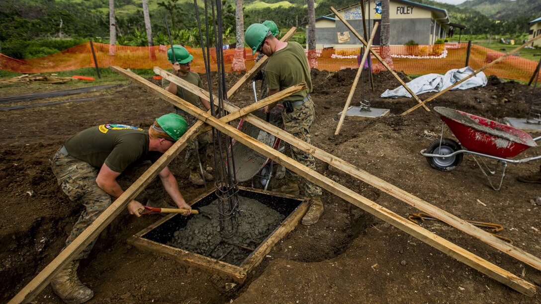 U.S. Marines and sailors with Task Force Koa Moana 16.2, conduct vertical construction training at St. John’s College, Ovalau, Fiji, July 4, 2016.  Marines and Sailors with the task force will share engineering skills with Fijians to strengthen mil-to-mil relationships and interoperability.