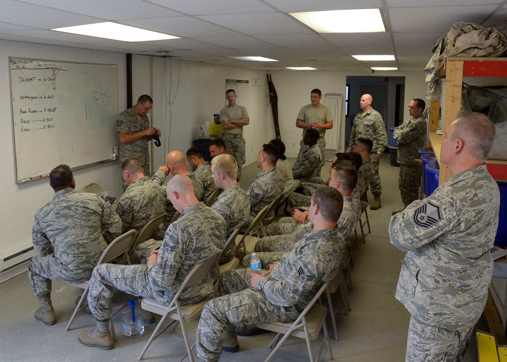 Staff Sgt. Shane Rickert, 445th Civil Engineer Squadron fire protection journeyman, teaches a self- aid and buddy care class to 445th CES Airmen June 3, 2016, at the Wright-Patterson Air Force Base Warfighter Training Center. The entire CES completed bivouac (temporary camp without tents or cover) training June 3-4, 2016 as part of the wing’s unit effectiveness inspection. (U.S. Air Force photo/Senior Airmen Joel A. McCullough)