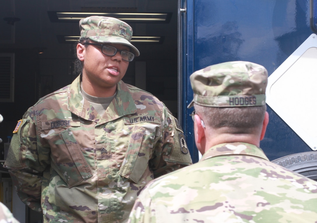 KAISERSLAUTERN, Germany- Army Sgt. Tameeka S. DuBose, a chemical operations specialist assigned to the 773rd Civil Support Team, 7th Mission Support Command and Darlington, South Carolina native briefs Lt. Gen. Frederick B. Hodges, commanding general U.S. Army Europe, about the Analytical Laboratory Systems vehicle she employs for her mission during a command visit to Daenner Kaserne on July 9, 2016. (U.S. Army photo by Sgt. Daniel J. Friedberg, 7th Mission Support Command Public Affairs Office)