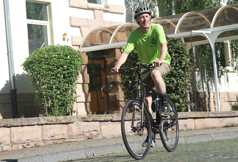 Spc. Terry Cunninham, a Soldier in the 7th Mission Support Command’s 406th Human resources Company, rides his bike Thursday June 23, 2016 on Daenner Kaserne in Kaiserslautern, Germany. Cunningham has logged about 3,000 miles on his bike since this spring.