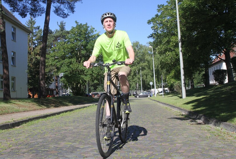 Spc. Terry Cunninham, a Soldier in the 7th Mission Support Command’s 406th Human resources Company, rides his bike Thursday June 23, 2016 on Daenner Kaserne in Kaiserslautern, Germany. Cunningham has logged about 3,000 miles on his bike since this spring.