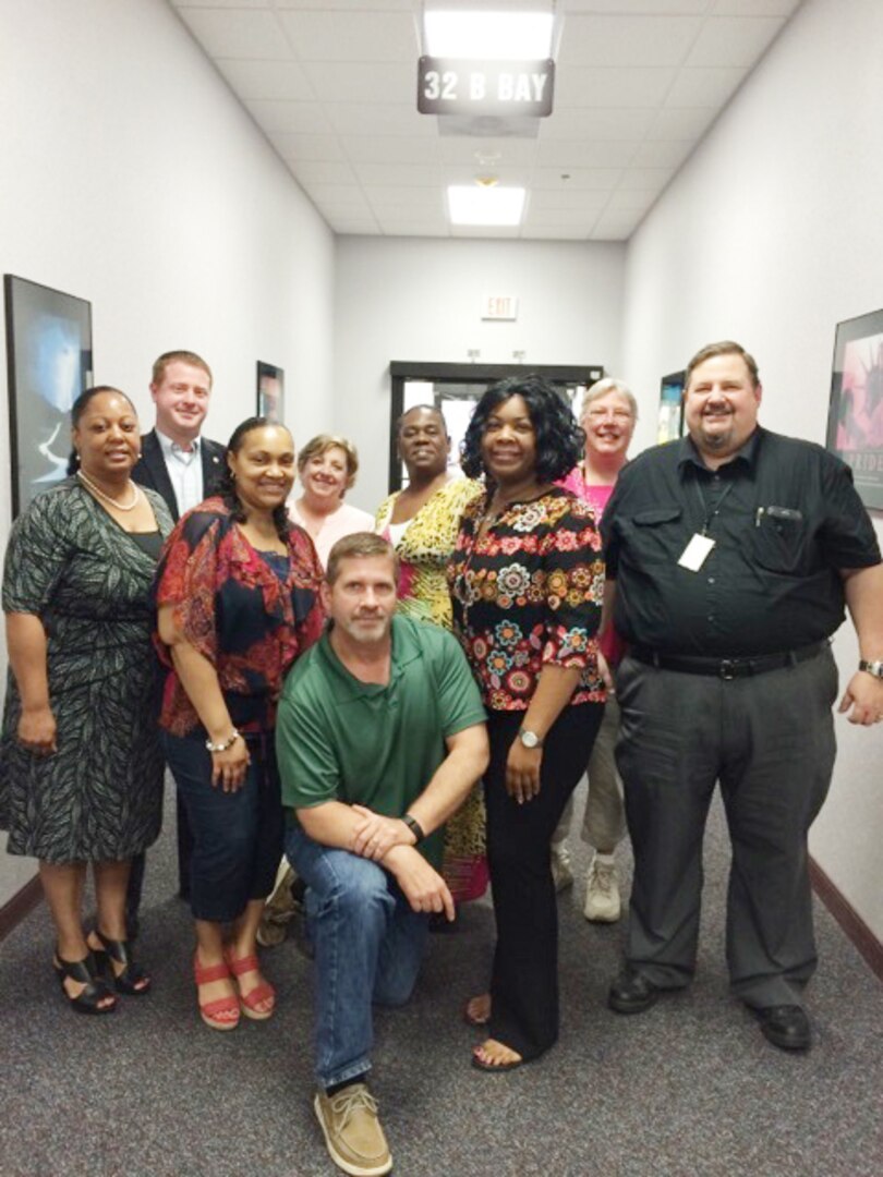 Defense Logistics Agency Aviation’s Contracting Operations Support Team poses for a photo June 24, 2016.  The team focuses on providing collaborative support across all phases of the acquisition process.  