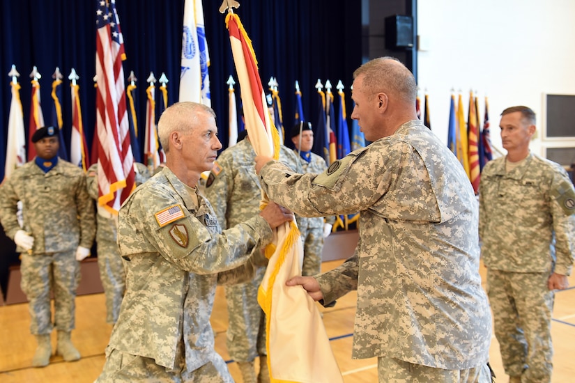 Army Reserve Brig. Gen. Frederick R. Maiocco Jr., Commanding General, 85th Support Command, passes the 2nd Mobilization Support Group flag to Lt. Col. Promotable Gary D. Curry during a change of command ceremony held in Arlington Heights, Illinois, on July 9, 2016. The passing of the flag symbolizes Maiocco’s trust and faith in Curry to successfully lead the 2nd MSG and to complete its mission.
(U.S. Army photo by Sgt. Aaron Berogan/Released)