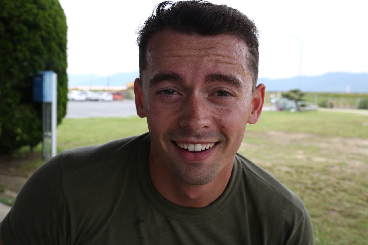 Marine Corps Sgt. Michael Eckert rests after completing the preliminary 2016 High Intensity Tactical Training Competition at Marine Corps Air Station Iwakuni, Japan, May 17, 2016. The three-event course tested competitors’ endurance, speed, agility and stamina. As the first place winner, Eckert will be traveling to MCAS Miramar in August to compete against other active-duty U.S. Marines from across the world at the 2016 HITT Athlete Championship. Marine Corps photo by Sgt. Jessica Quezada