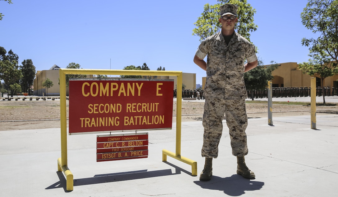 Private Richard A. Faler, Echo Company, 2nd Recruit Training Battalion, stands next to his squad bay at Marine Corps Recruit Depot San Diego, July 5. Following recruit training, Faler will continue his schooling at Marine Combat Training at Marine Corps Base Camp Pendleton, Calif., and then on to his military occupational specialty school to learn his profession of communications. Annually, more than 17,000 males recruited from the Western Recruiting Region are trained at MCRD San Diego. Echo Company is scheduled to graduate July 8. 