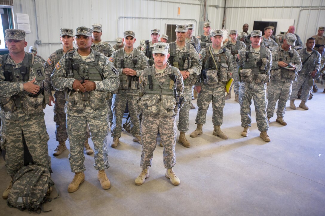 U.S. Army Observer, Controller, Trainers (OCT’s) from the 181st Infantry Brigade attend the warm start brief during Warrior Exercise (WAREX) 86-16-03 at Fort McCoy, Wis., July 11, 2016. WAREX is designed to keep soldiers all across the United States ready to deploy.
(U.S. Army photo by Spc. John Russell/Released)