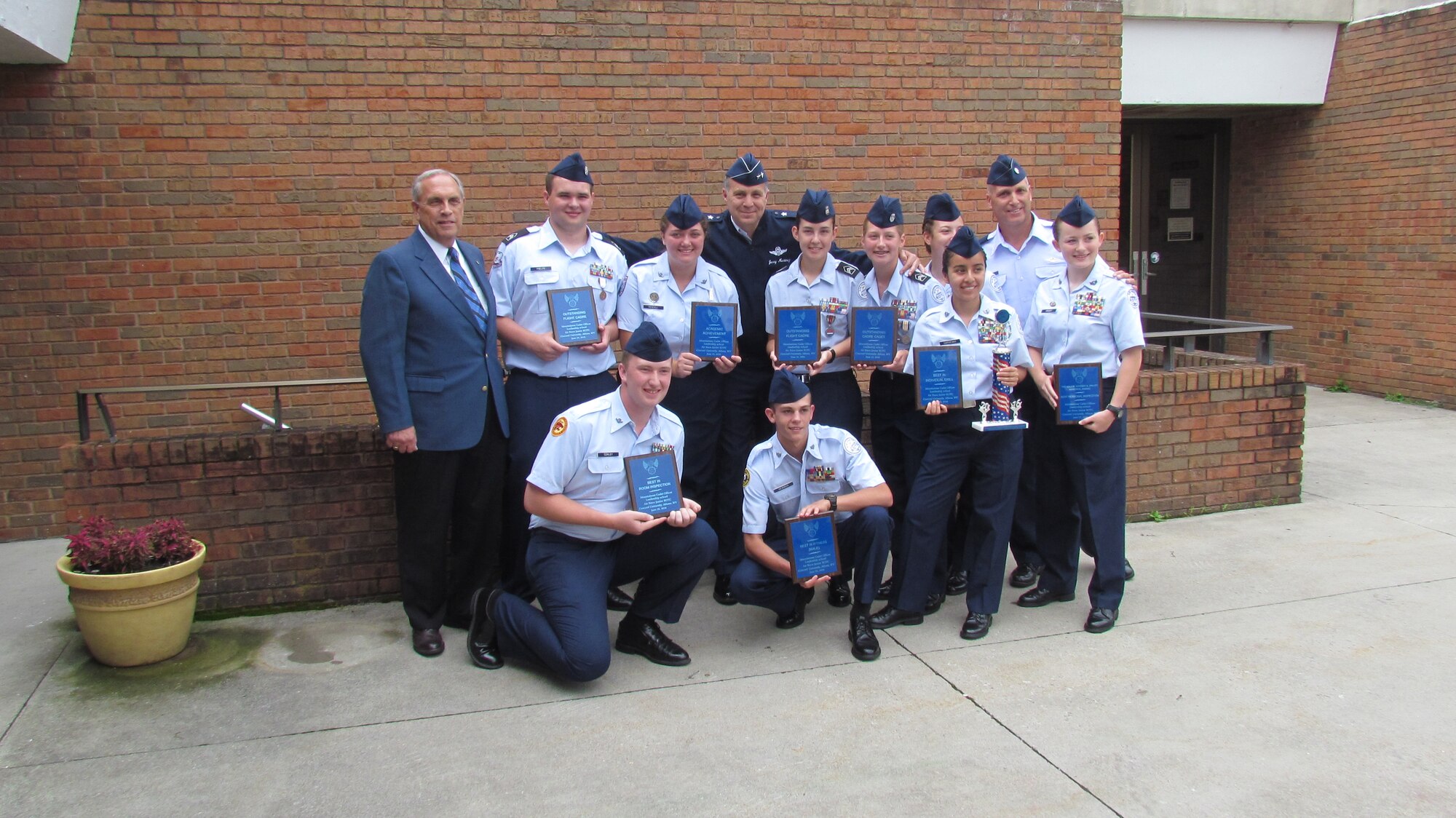 Major Gen. Jerry Martinez (center), the director of operations for Air Mobility Command, poses with Air Force JROTC cadets and was the guest speaker for the graduation event for the ‘Mountaineer Cadet Officer Leadership School,’ held in Athens, West Virginia, June 19-25. (Courtesy photo)
