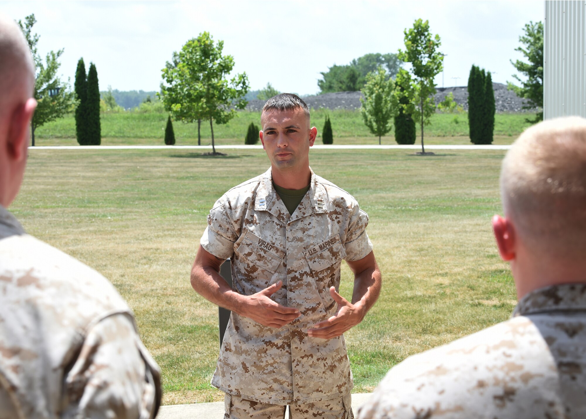 Capt. Pierce Virag, Detachment One, Communication Company, Combat Logistics Regiment 45, 4th Marine Logistics Group inspector instructor, addresses Marines during a formation held here, July 12, 2016. Virag took command of the unit July 1, and plans for his Marines to be active in the community and continuously improve every day. (U.S. Air Force photo/Senior Airman Andrew Crawford)