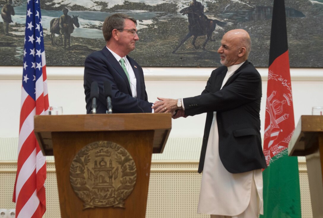 Defense Secretary Ash Carter shakes hands with Afghan President Ashraf Ghani during a joint news conference in Kabul, Afghanistan, July 12, 2016. DoD photo by Navy Petty Officer 1st Class Tim D. Godbee