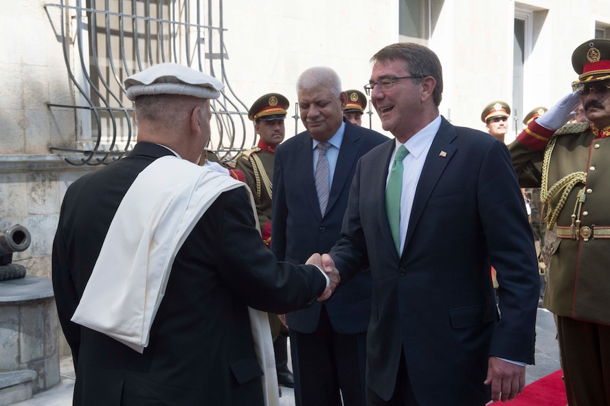 Defense Secretary Ash Carter exchanges greeting with Afghan President Ashraf Ghani.