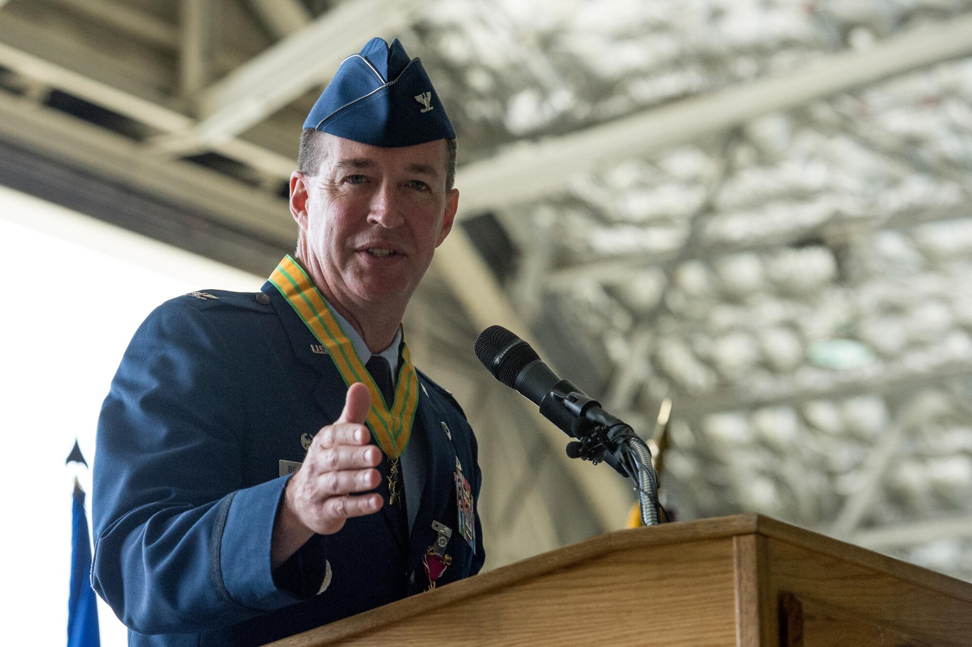 Air Force Col. Brian Bruckabuer speaks at the 673d Air Base Wing and Joint Base Elmendorf-Richardson, Alaska, change of command ceremony at Hangar 1 on JBER, Monday, July 11, 2016. Bruckbauer turned over command to Air Force Col. George Dietrich III as Air Force Lt. Gen. Russell Handy, the appointed commander of Pacific Air Forces, officiated before gathered family members, distinguished guests and military personnel. (U.S. Air Force photo/Justin Connaher)