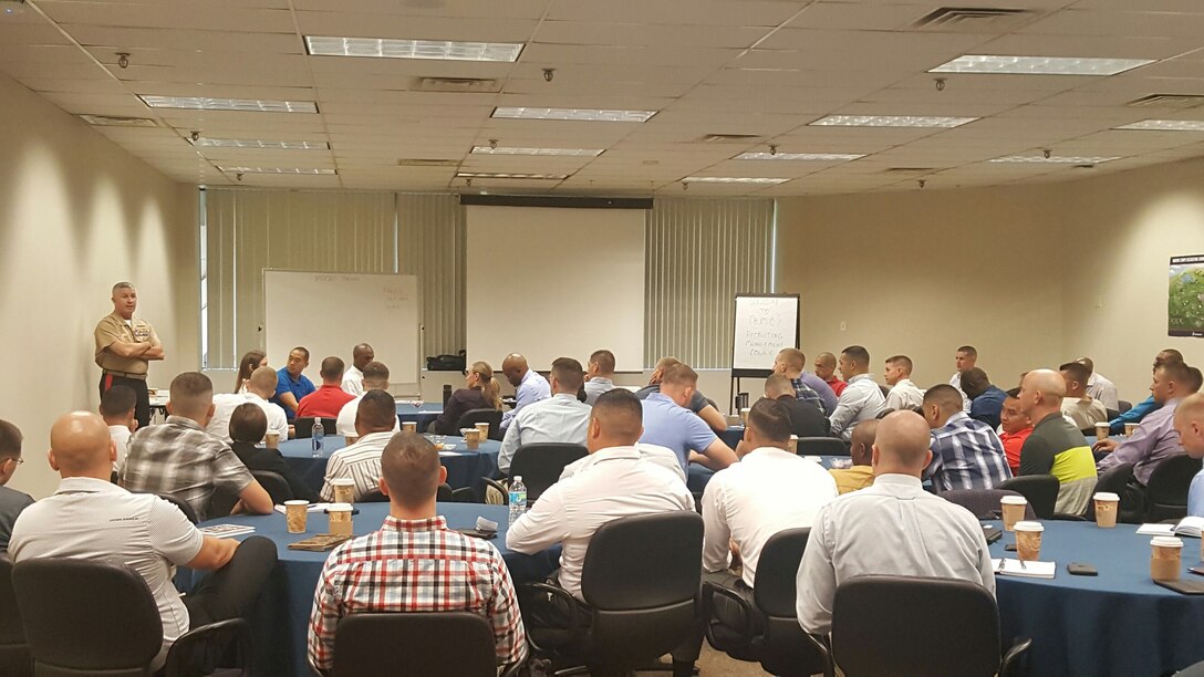 Major General Paul J. Kennedy speaks with Marines attending the Recruiter Management Course and Officer Selection Officer Course at the National Conference Center in Leesburg, Va., on July 12, 2016. The courses are designed to provide Marines the fundamentals and importance of systematic recruiting, and the leadership to excel in their new billet. Kennedy is the commanding general of Marine Corps Recruiting Command.