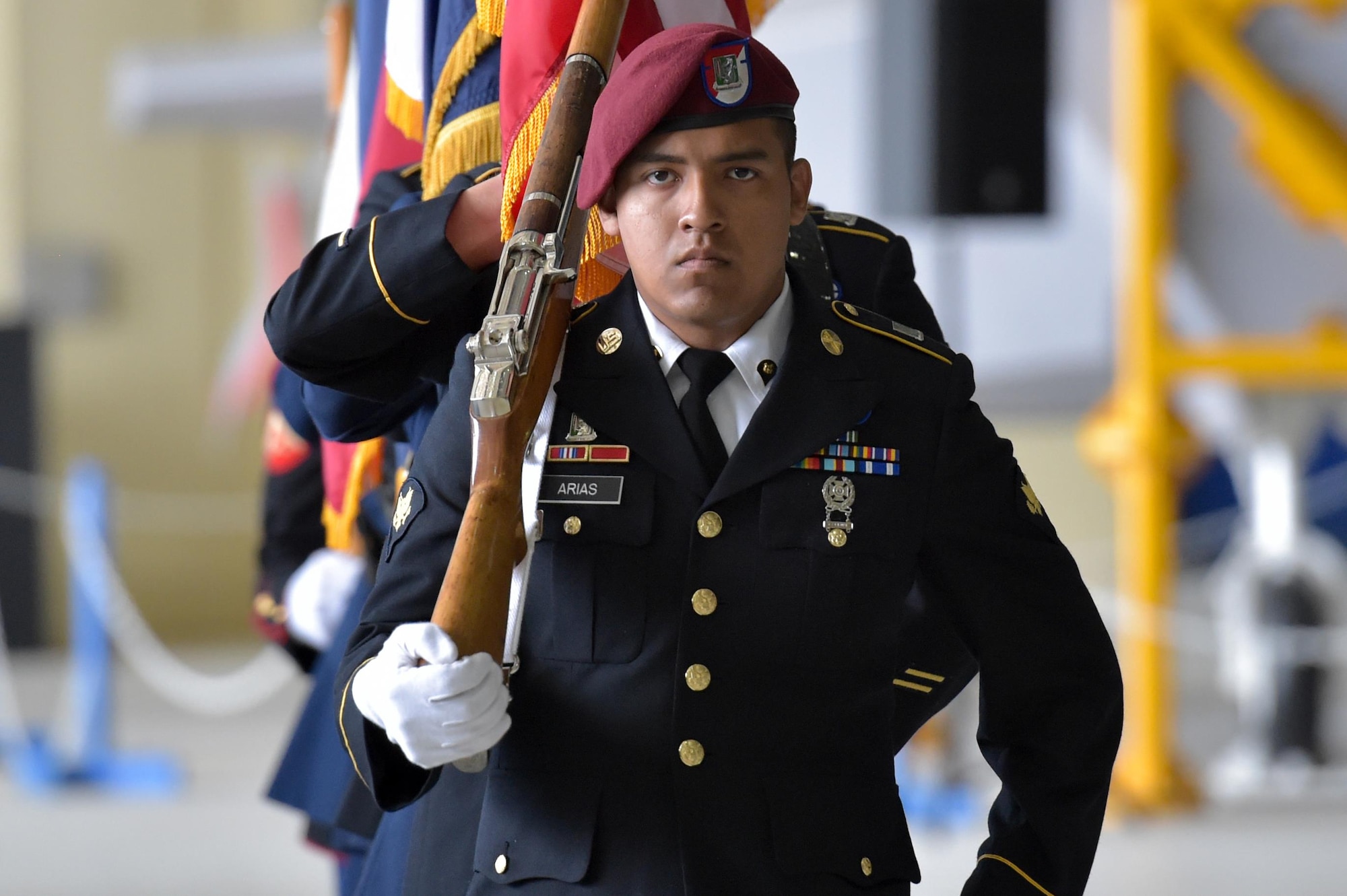 The honor guard enters the 673d Air Base Wing and Joint Base Elmendorf-Richardson, Alaska, change of command ceremony at Hangar 1 on JBER, Monday, July 11, 2016. U.S. Air Force Col. Brian Bruckbauer turned over command to Air Force Col. George Dietrich III as Air Force Lt. Gen. Russell Handy, the appointed commander of Pacific Air Forces, officiated before gathered family members, distinguished guests and military personnel. (U.S. Air Force photo/Justin Connaher)