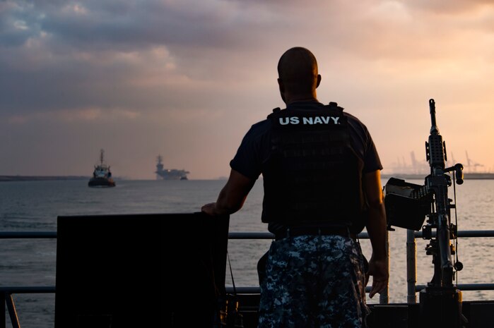 (July 8, 2016) Interior Communications Electrician 1st Class Brad Mckay, assigned to the guided-missile cruiser USS San Jacinto (CG 56), stands watch as the ship enters the Suez Canal. San Jacinto, deployed as part of the Eisenhower Carrier Strike Group, is supporting maritime security operations and theater security cooperation efforts in the U.S. 5th Fleet area of operations.