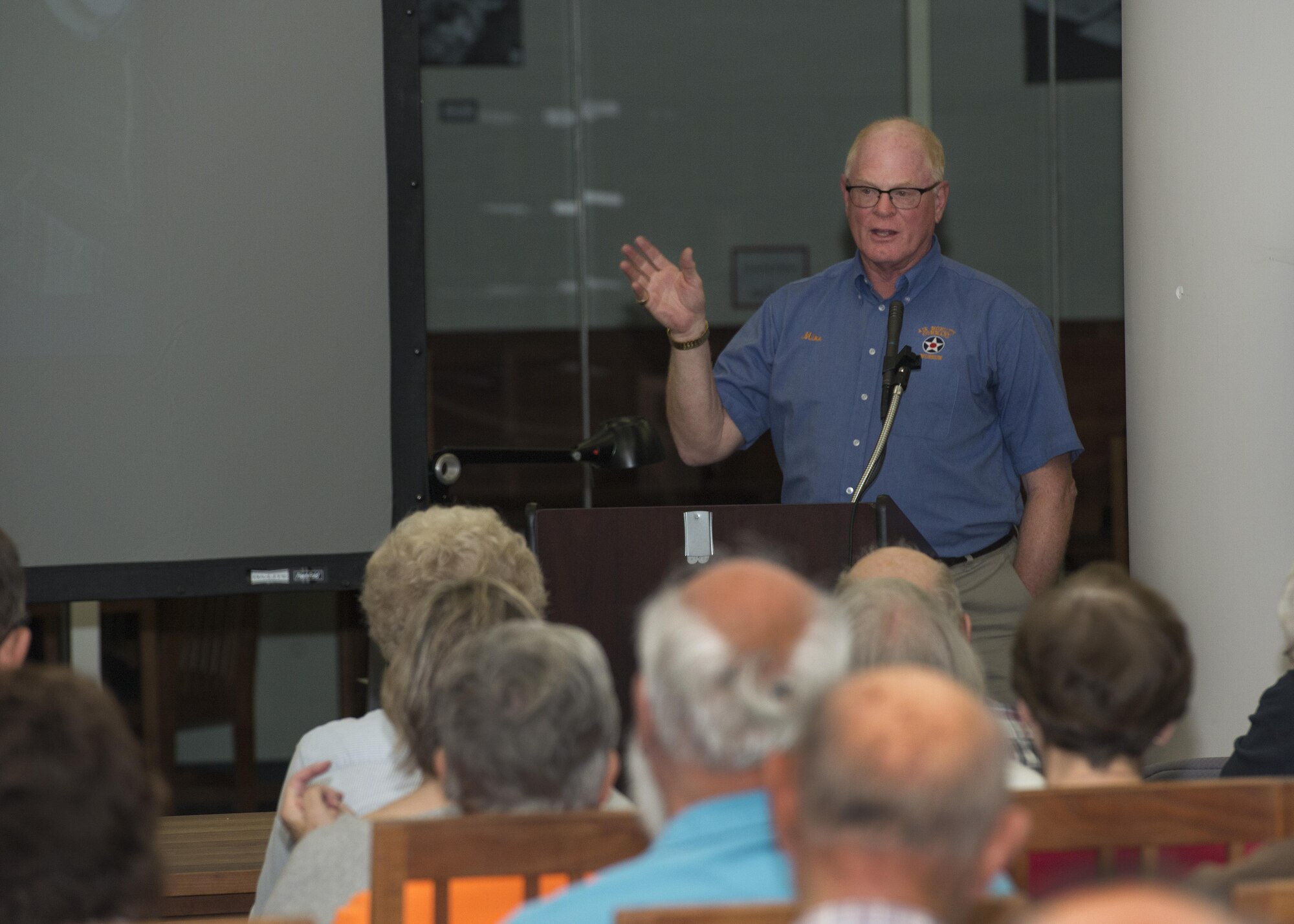 Mike Leister, Air Mobility Command Museum director, speaks on the history of Dover Air Force Base in a program titled, “From Humble Beginnings: A Short History of Dover AFB, the First 30 Years,” July 2, 2016, at the Delaware Public Archives in Dover, Del. More than 100 people attended the lecture. (U.S. Air Force photo/Senior Airman Zachary Cacicia)
