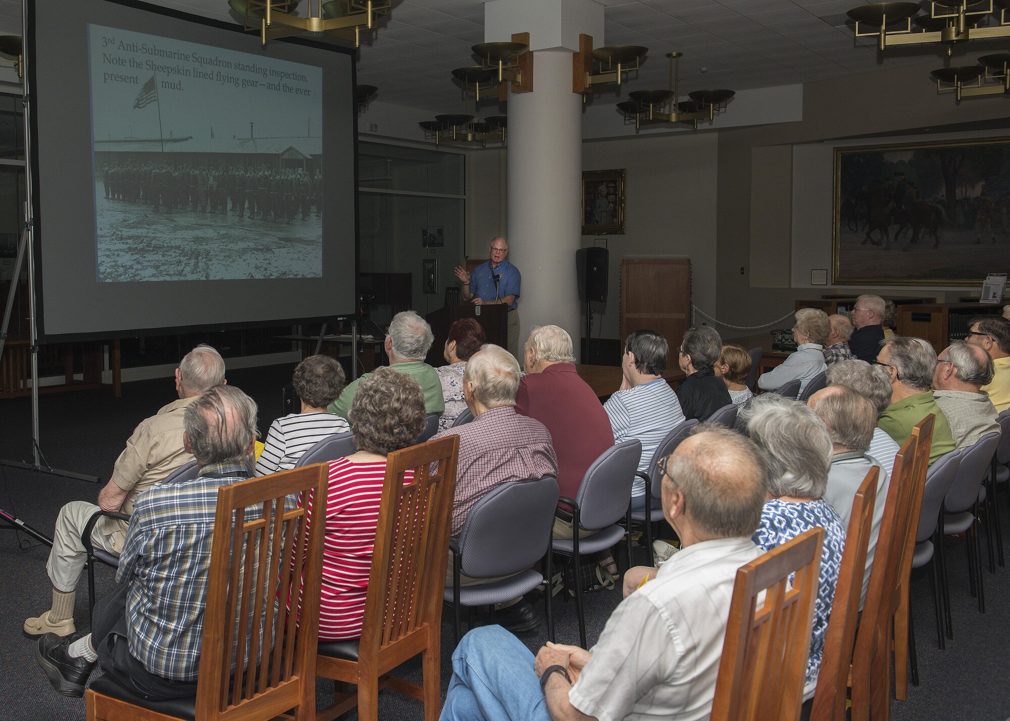 Mike Leister, Air Mobility Command Museum director, speaks on the history of Dover Air Force Base in a program titled, “From Humble Beginnings: A Short History of Dover AFB, the First 30 Years,” July 2, 2016, at the Delaware Public Archives in Dover, Del. Leister covered the base’s history from its origins as a U.S. Army air base during World War II, through the Cold War era and the introduction of the C-5A Galaxy. (U.S. Air Force photo/Senior Airman Zachary Cacicia)