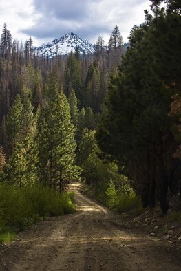 Trinity Mountain looms over the Rainbow Basin in the Boise National Forest, Idaho May 15, 2015. The roads leading to the Rainbow Basin are often left inaccessible in the winter and spring due to large amounts of melting ice. (U.S. Air Force photo by Airman 1st Class Connor J. Marth/RELEASED)