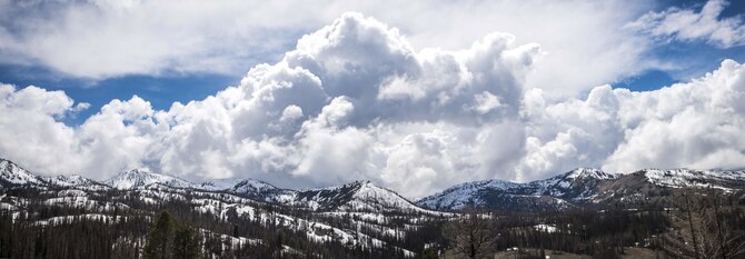 Clouds build in the distance of Rainbow Basin in Boise National Forest, Idaho, May 15, 2015. Snow will often linger on the mountains of the Boise National Forest for the spring and even into the early summer. (U.S. Air Force photo by Airman 1st Class Connor J. Marth/RELEASED)