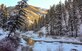 The setting sun shines on a mountain near Rainbow Basin in the Boise National Forest, Idaho, 2015. Streams and rivers between mountains are often home to trout and other small fish. (Courtesy photo by Aj Workinger/RELEASED) 