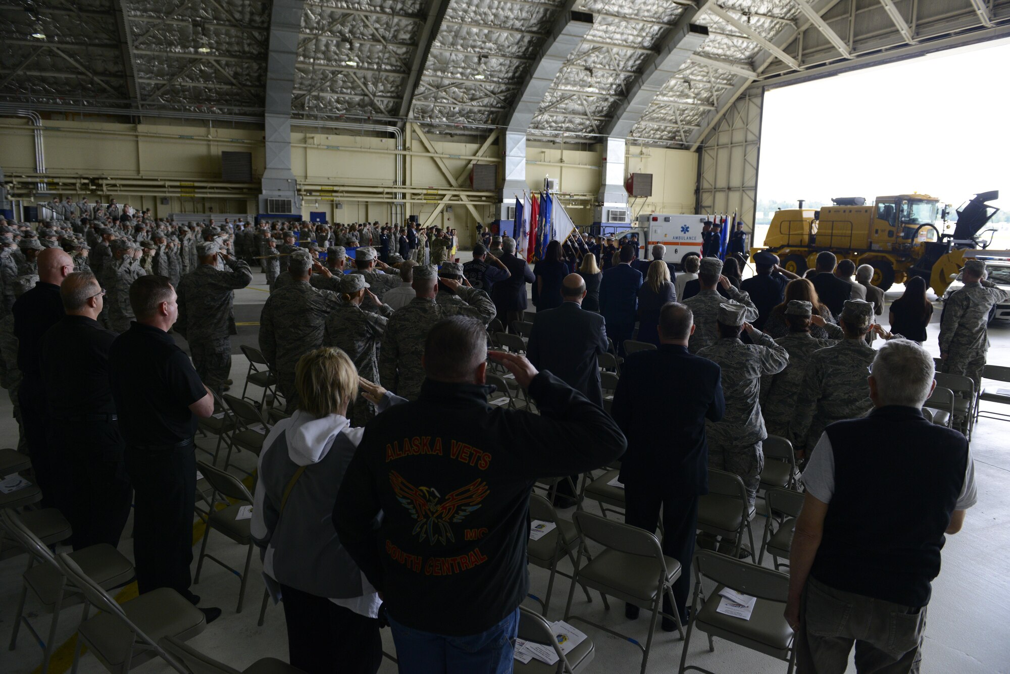 The National Anthem, Canada's Anthem and Alaska State song are played at 673d Air Base Wing and Joint Base Elmendorf-Richardson, Alaska change of command ceremony at Hangar 1, July 11, 2016. U.S. Air Force Col. Brian Bruckbauer turned over command to Air Force Col. George Dietrich III as Air Force Lt. Gen. Russell Handy, the appointed commander of Pacific Air Forces; Air Component Commander for the U.S. Pacific Command, officiated before gathered family members, distinguished guests and military personnel. (U.S. Air Force photo by Senior Airman Kyle Johnson)