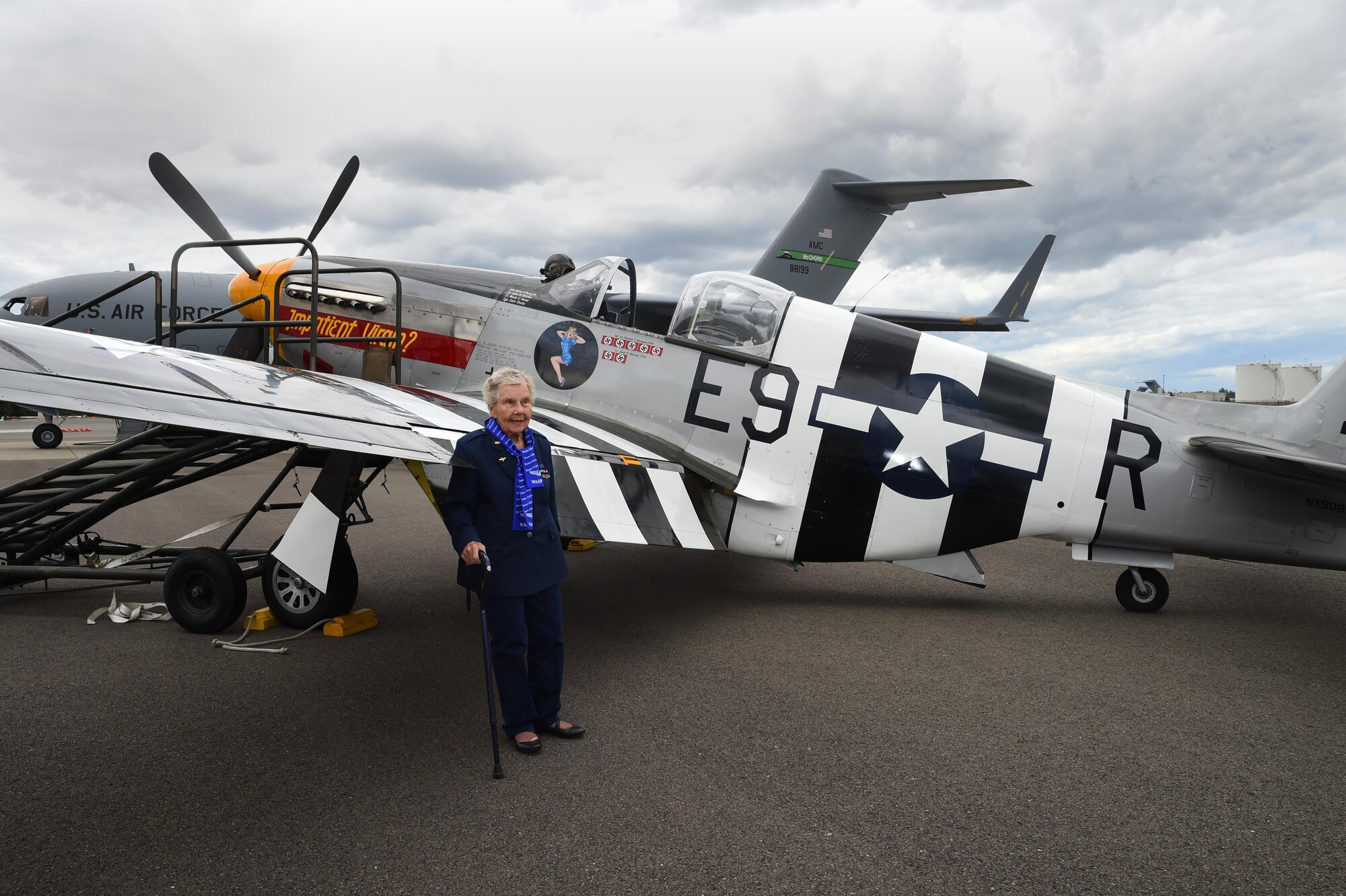 Dorothy Olsen, former Women Airforce Service Pilot, stands in front of a P-51 Mustang on the McChord Field flight line July 10, 2016, at Joint Base Lewis-McChord, Wash. Olsen celebrated her 100th birthday at McChord along with three other WASPs, their families and McChord leadership. (Air Force Photo/Staff Sgt. Naomi Shipley)