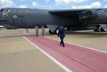 Airmen salute Col. Kurt Schendzielos, 2nd Operations Group commander, in presentation of the 2nd OG flagship aircraft at Barksdale Air Force Base, La., July 7, 2016. During his career, Schendzielos has accumulated more than 2,000 flight hours, including 274 combat hours. (U.S. Air Force photo/Senior Airman Curt Beach)