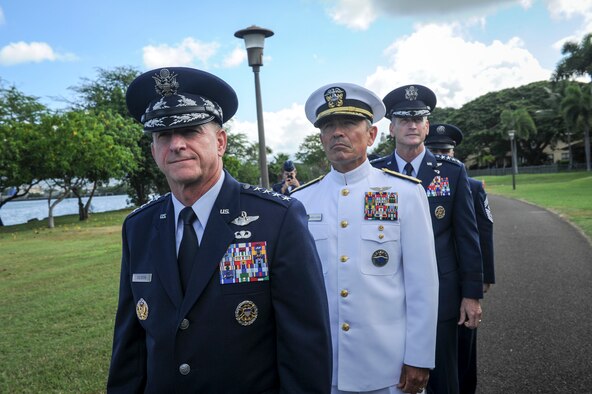 Gen. David L. Goldfein, U.S. Air Force Chief of Staff, Adm. Harry B. Harris, Jr., U.S. Pacific Command commander, and Gen. Terrence J. O’Shaughnessy prepare to arrive at an an assumption-of-command ceremony at Joint Base Pearl Harbor-Hickam, Hawaii, Tuesday, July 12, 2016. During the ceremony, O’Shaughnessy, assumed command of Pacific Air Forces. (U.S. Air Force photo by Staff Sgt. Kamaile Chan)