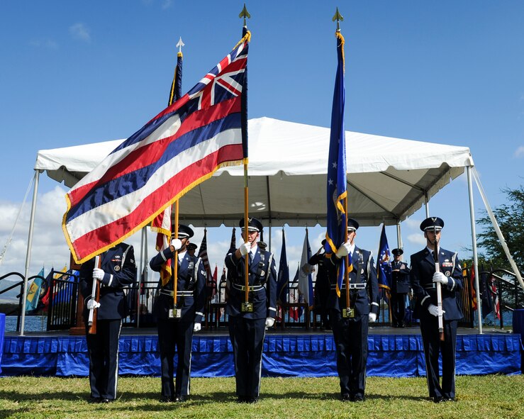 The 15th Wing Honor Guard presents the colors during an assumption-of-command ceremony at Joint Base Pearl Harbor-Hickam, Hawaii, July 12, 2016. During the ceremony, Gen. Terrence J. O’Shaughnessy assumed command of Pacific Air Forces. (U.S. Air Force photo by Staff Sgt. Kamaile Chan)