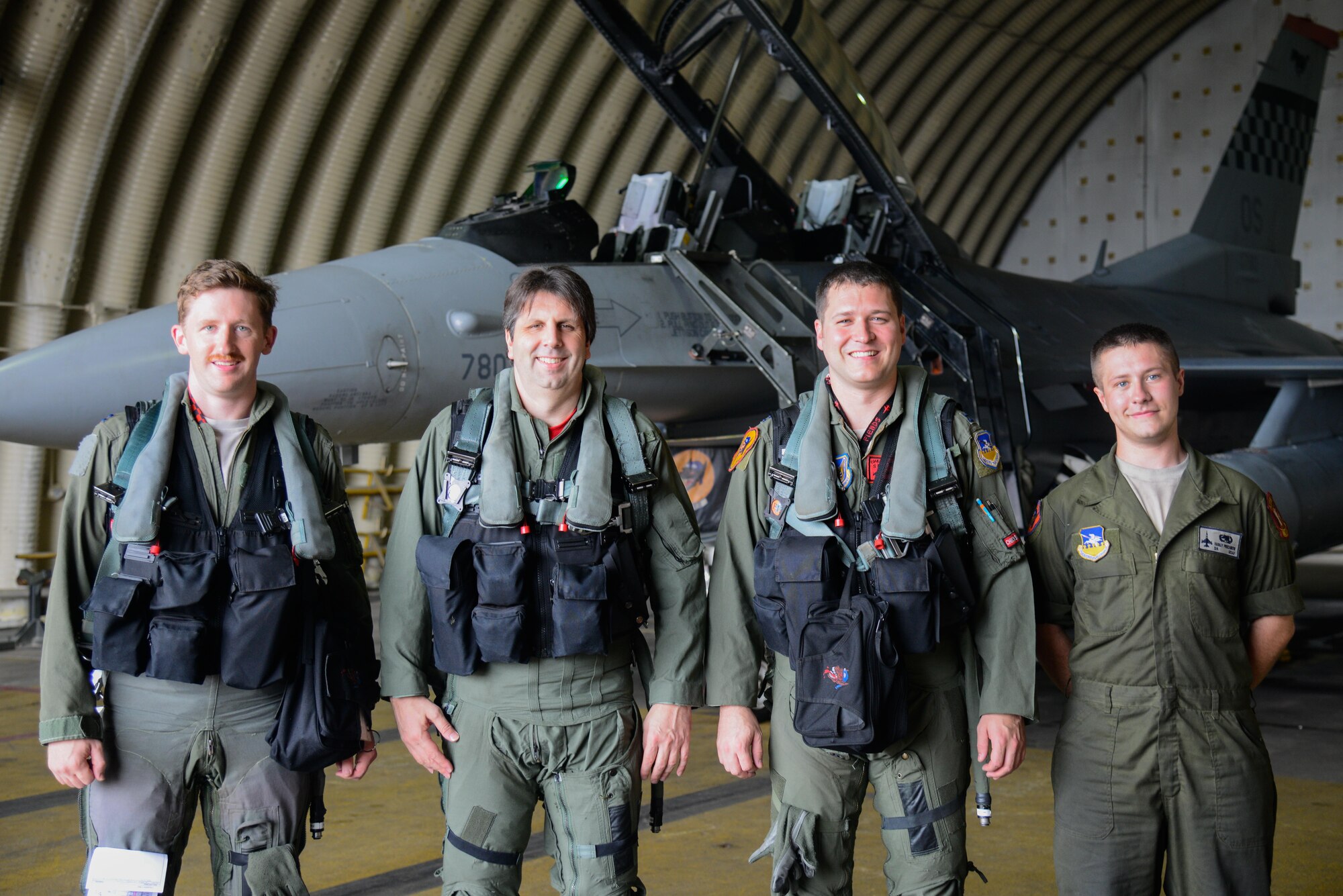 U.S. Ambassador to the Republic of Korea Mark Lippert, second from left, poses for a photo with Osan Airmen before a familiarization flight in an F-16 Fighting Falcon at Osan Air Base, Republic of Korea, July 12, 2016. Lippert flew in the aircraft to better understand Seventh Air Force’s role in the defense of the RoK as part of United States Forces Korea. (U.S. Air Force photo by Senior Airman Dillian Bamman/Released)