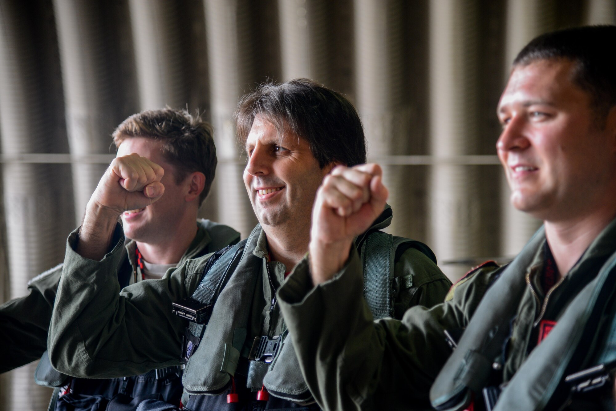 U.S. Ambassador to the Republic of Korea Mark Lippert poses for a photo with Osan Airmen before a familiarization flight in an F-16 Fighting Falcon at Osan Air Base, Republic of Korea, July 12, 2016. Lippert flew in the aircraft to better understand Seventh Air Force’s role in the defense of the RoK as part of United States Forces Korea. (U.S. Air Force photo by Senior Airman Dillian Bamman/Released)