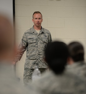 U.S. Air Force Tech. Sgt. Kristopher Parrish, 633rd Security Forces Squadron physical security NCO in charge and Club 5/6 professional development chairman, leads a guided discussion at Langley Air Force Base, Va., July 7, 2016. Langley Club 5/6 began hosting leadership seminars based on the TV miniseries “Band of Brothers” which aired in 2001. (U.S. Air Force photo by Staff Sgt. Teresa J. Cleveland)